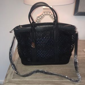 Cole Haan black woven leather bag.